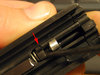 red arrow pointing to crack in the plastic/composite "striker guide" of my 9mm Walther PPS